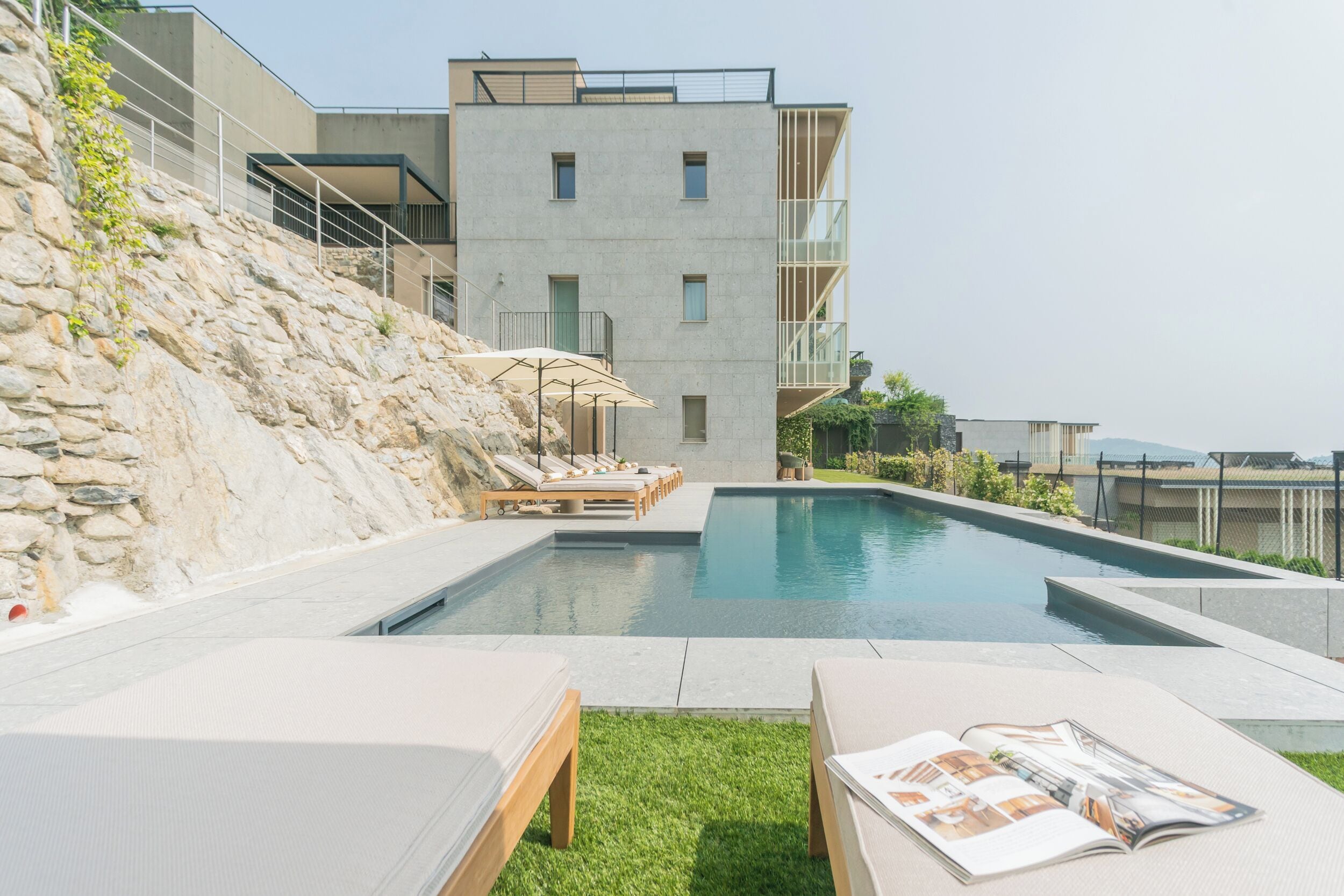 Seasonal outdoor pool, pool umbrellas, pool loungers