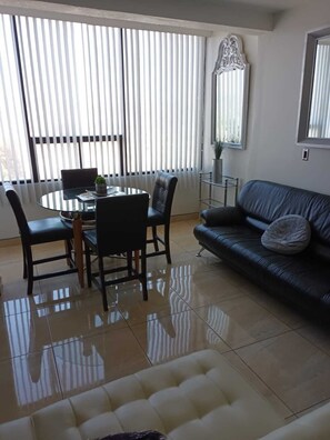 Living area - Lovely condo with AC in vibrant Tijuana Excellent location main avenue SAFE (Tijuana)