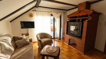 Villa (Three Bedroom Villa) | Living room | 32-inch flat-screen TV with satellite channels