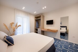 4 sovrum, värdeförvaringsskåp på rummet och strykjärn/strykbräda