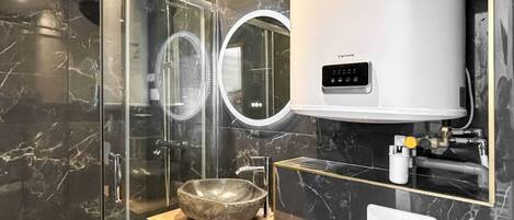 Shower, hair dryer, towels