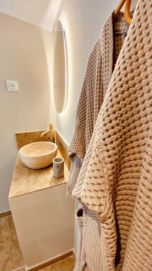 Hair dryer, towels, soap, toilet paper