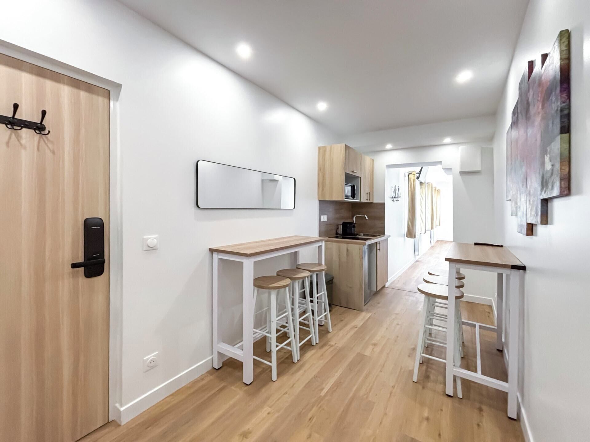 Fridge, microwave, coffee/tea maker, cookware/dishes/utensils