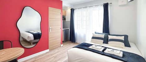 Fer et planche Ă repasser, Wi-Fi gratuit, draps fournis