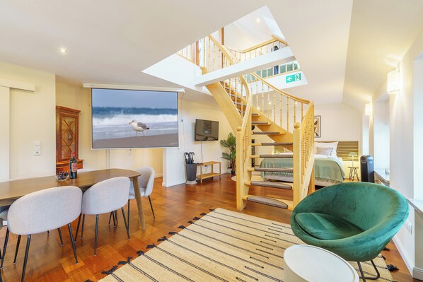 Comfort Duplex, River View | Living area | 50-cm Smart TV with cable channels