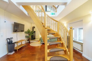 Comfort Duplex, River View | Living area | 50-cm Smart TV with cable channels