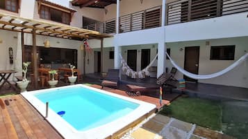 Outdoor pool, open 9:00 AM to 8:00 PM, pool loungers