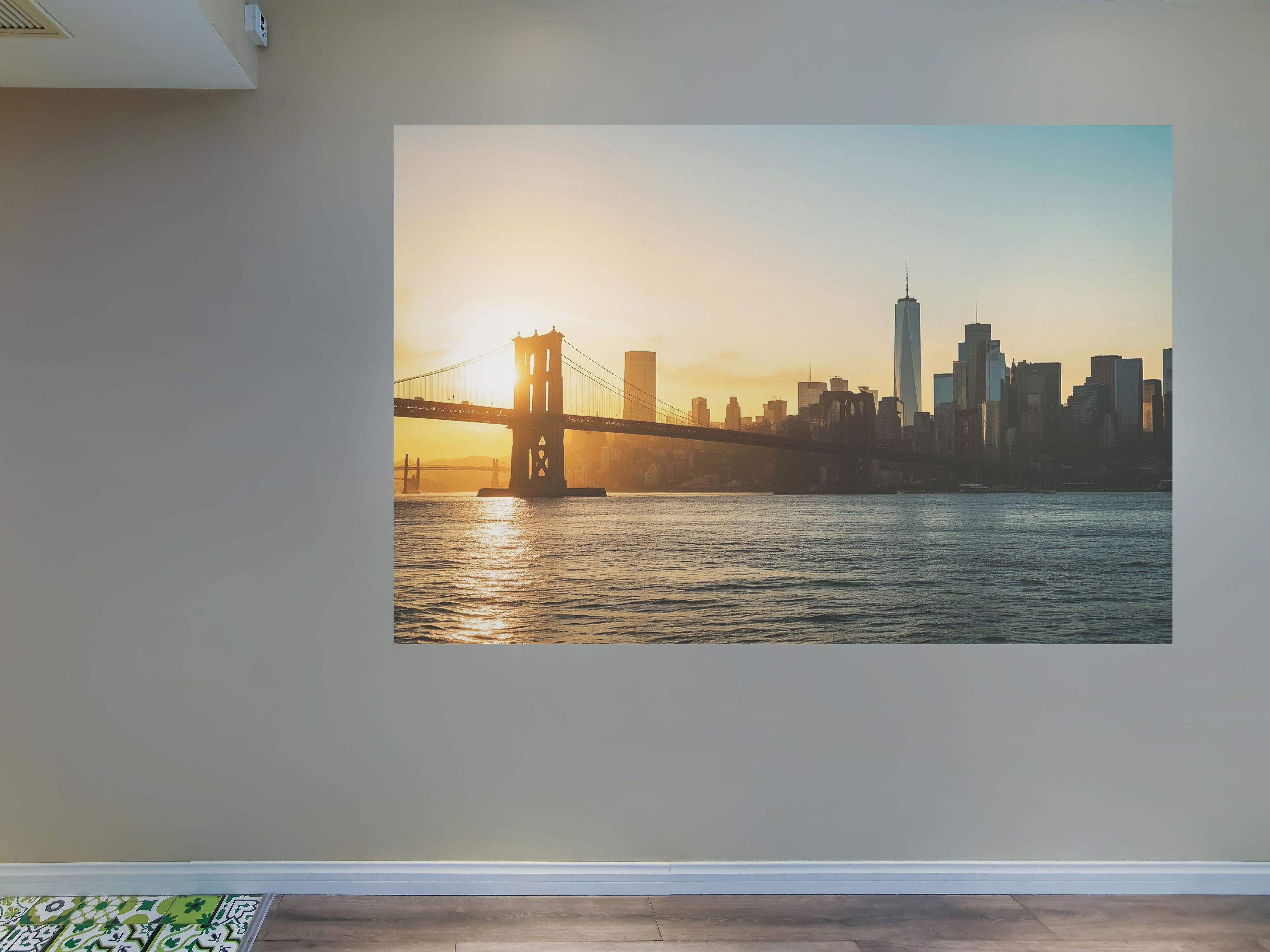 A framed cityscape with a bridge and buildings.