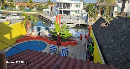 Welcome to Villa Carolina, AC, Pool, short walk to downtown Barra and the ocean.