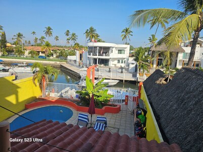 Welcome to Villa Carolina, AC, Pool, short walk to downtown Barra and the ocean.
