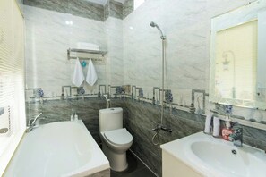 Shower, free toiletries, hair dryer, towels