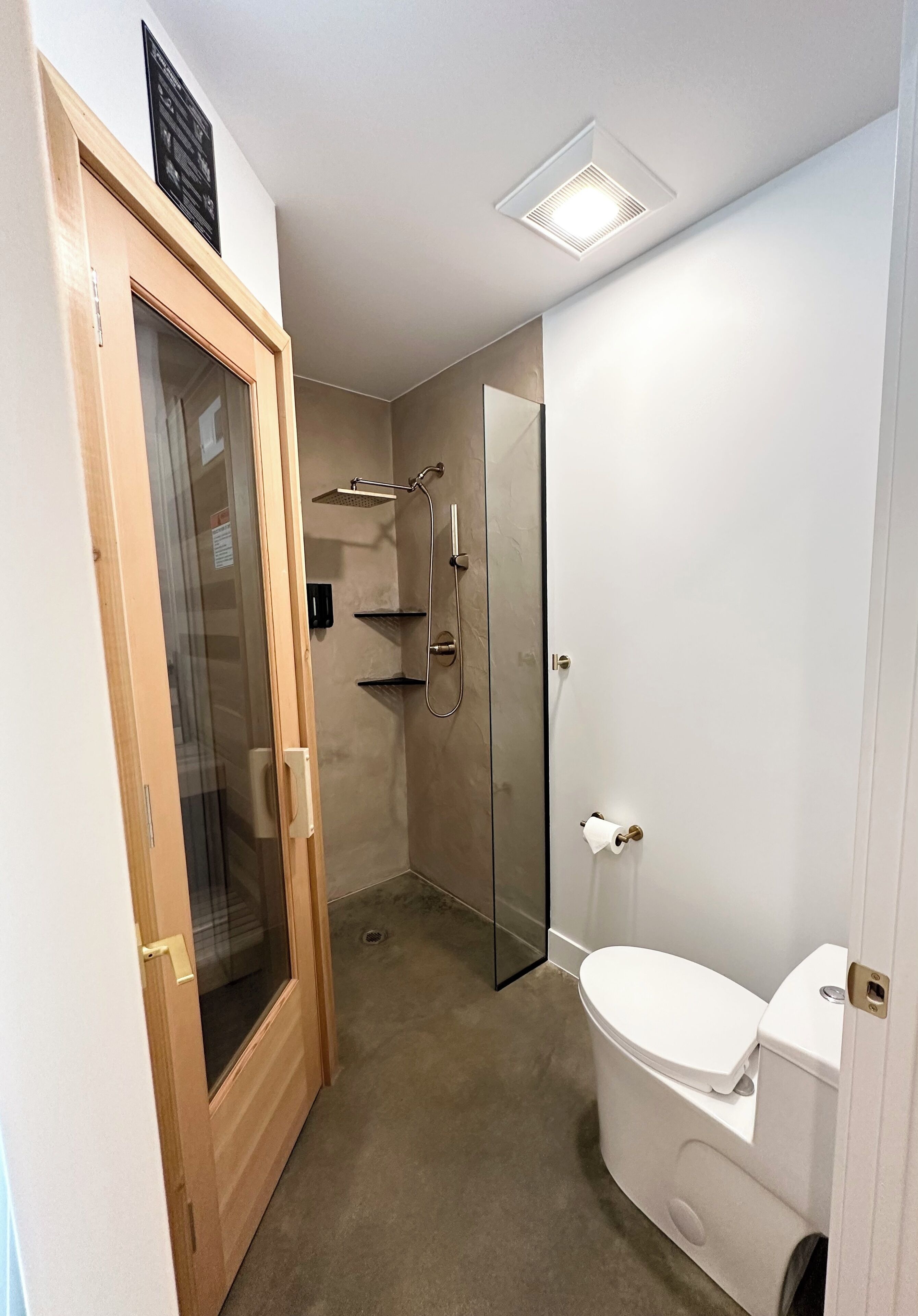 Shower, towels, soap, toilet paper