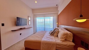2 habitaciones y tabla de planchar con plancha