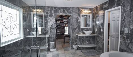 Shower, jetted tub, towels, soap