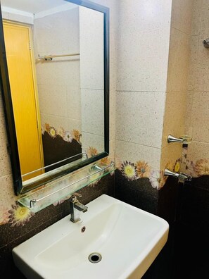 Shower, towels, soap, shampoo