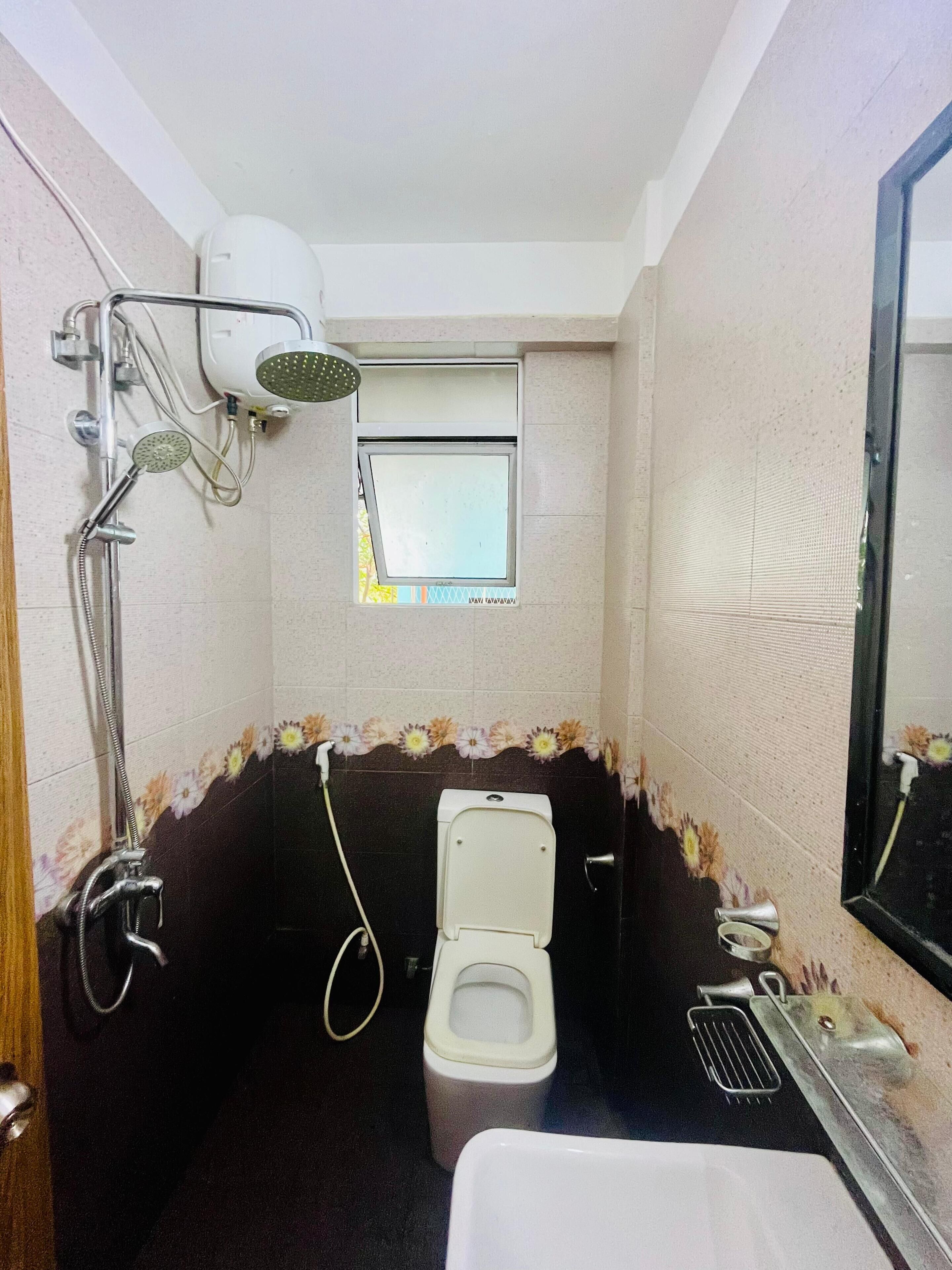 Basic Room, 2 Bedrooms | Bathroom | Shower, towels, soap, shampoo
