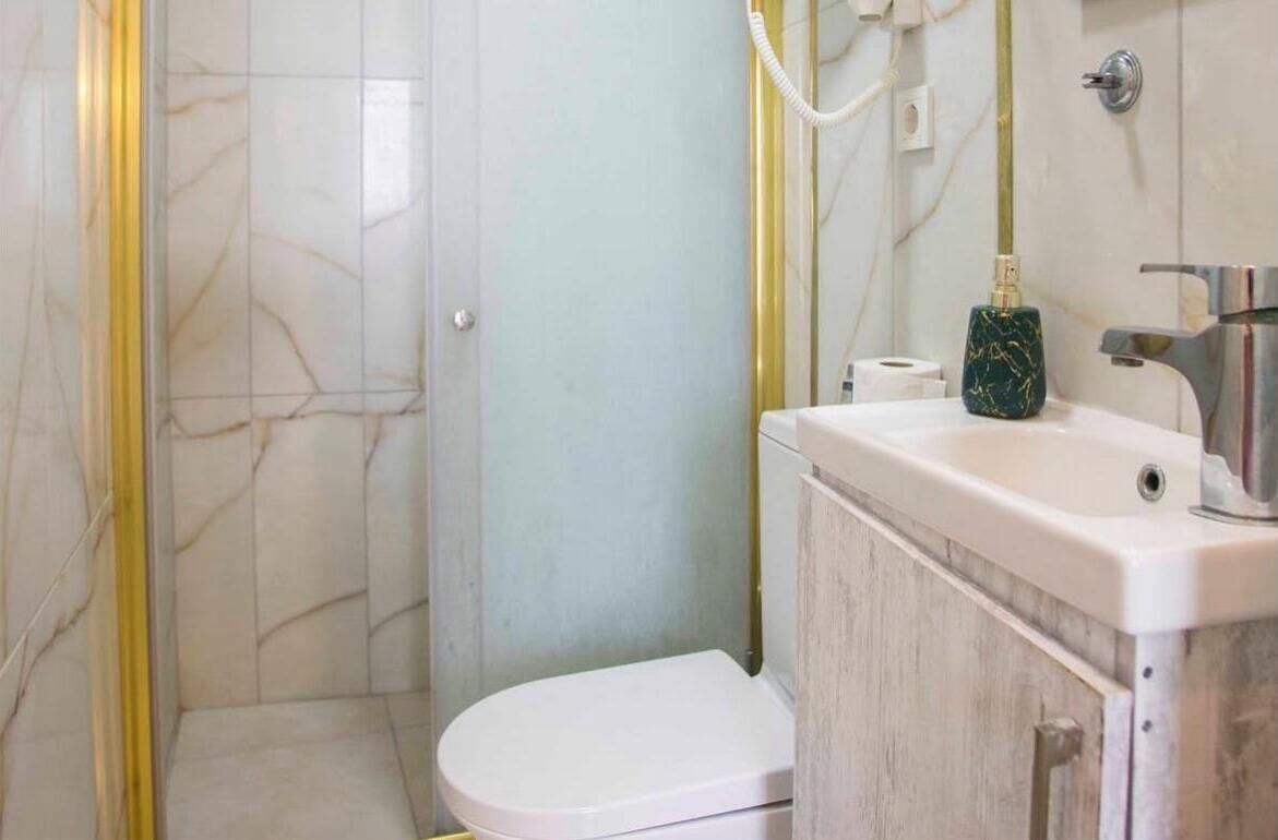 Room, Sea View | Bathroom | Shower, hair dryer, towels, soap