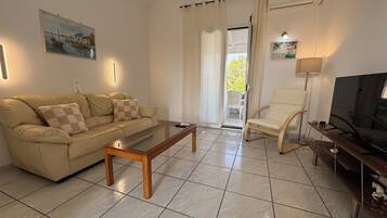 Apartamento luxo, vista para o mar | Área de estar