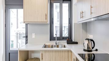 Deluxe Apartment, 2 Bedrooms | Private kitchen | Espresso maker, coffee/tea maker, electric kettle