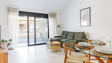 Superior Apartment, 2 Bedrooms | Living area | 40-inch Smart TV with digital channels