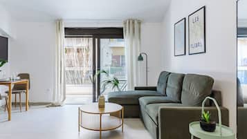 Superior Apartment, 1 Bedroom | Living area | 40-inch Smart TV with digital channels