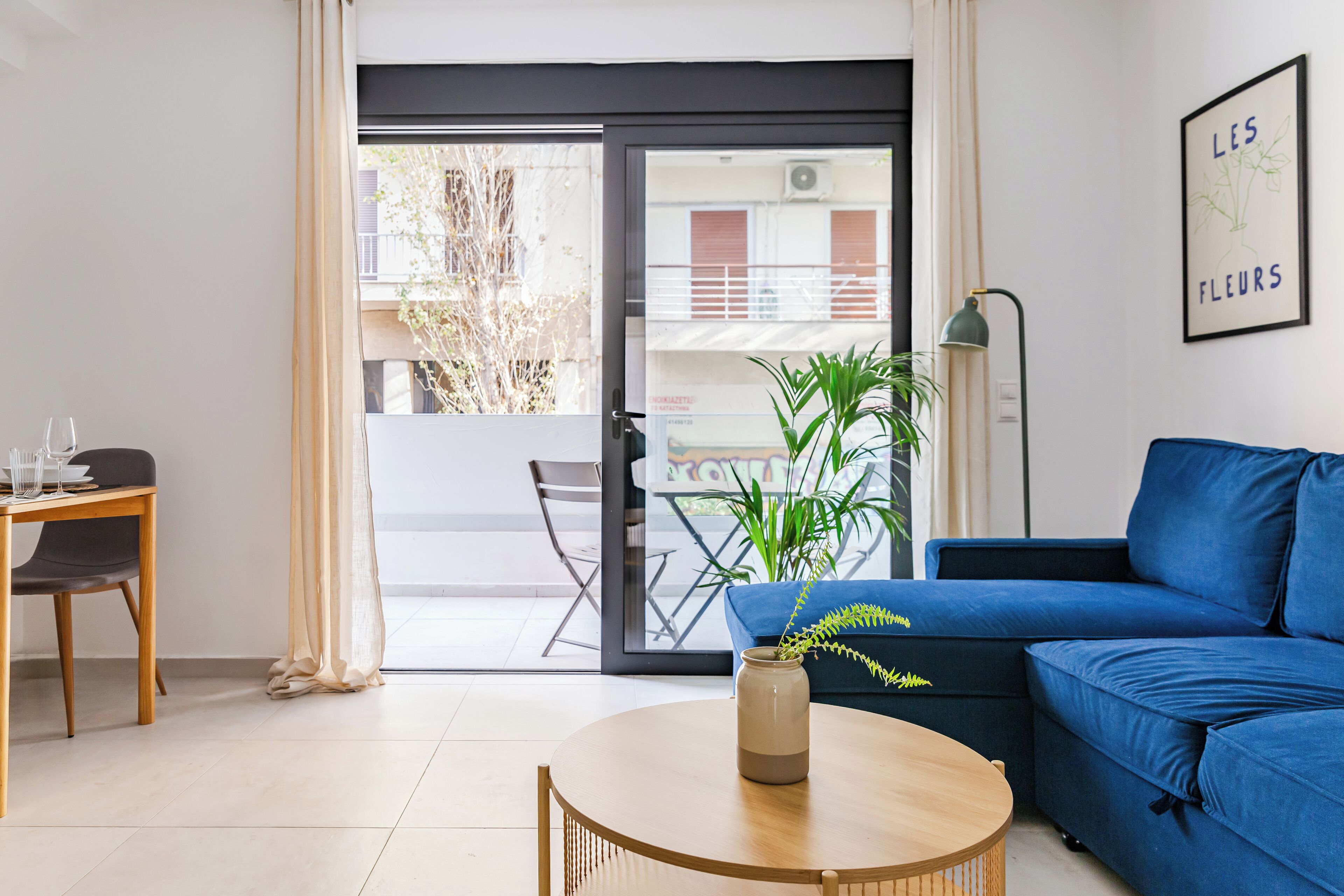 Deluxe Apartment, 1 Bedroom, Balcony | Living area | 40-inch Smart TV with digital channels