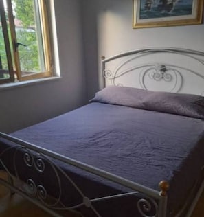 2 dormitorios, tabla de planchar con plancha, wifi gratis y ropa de cama