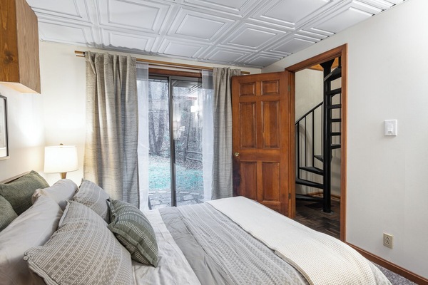 Bedroom accessed from the spiral staircase