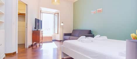 1 bedroom, desk, iron/ironing board, travel cot