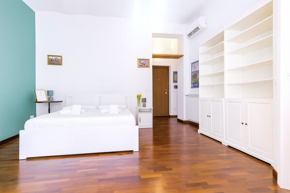 1 bedroom, desk, iron/ironing board, travel crib