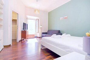 1 bedroom, desk, iron/ironing board, travel cot