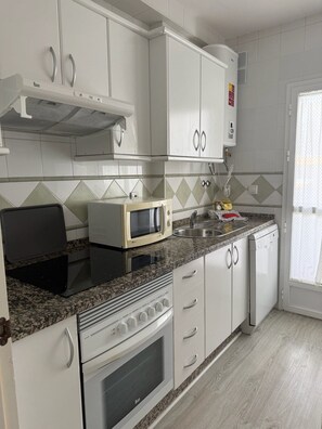 Apartment | Private kitchen - Central Apartment in Ayamonte (Ayamonte)