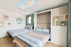 1 dormitorio, tabla de planchar con plancha, cuna de viaje y wifi
