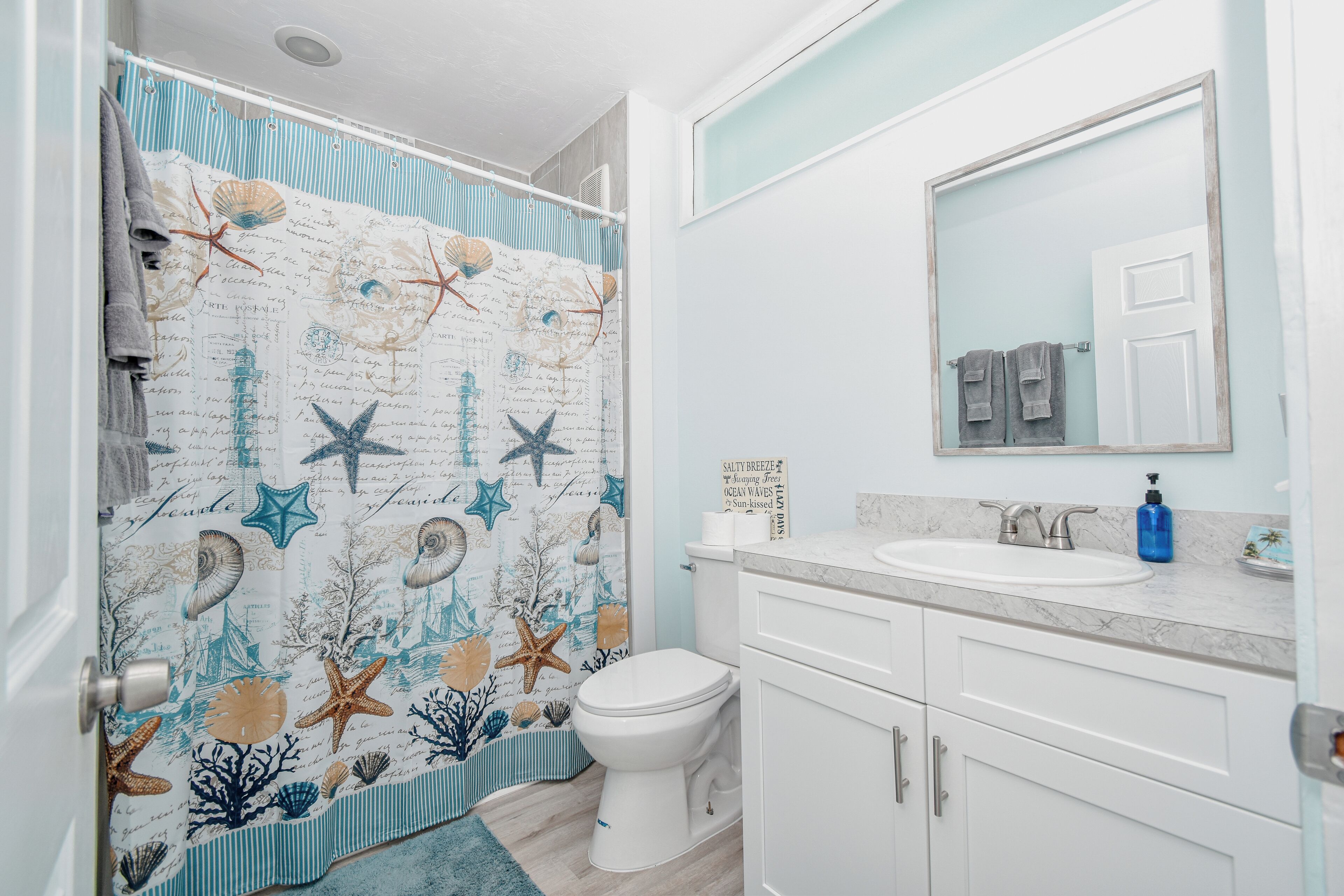 Shower, towels, toilet paper