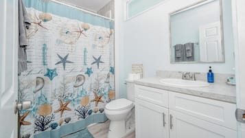 Shower, towels, toilet paper