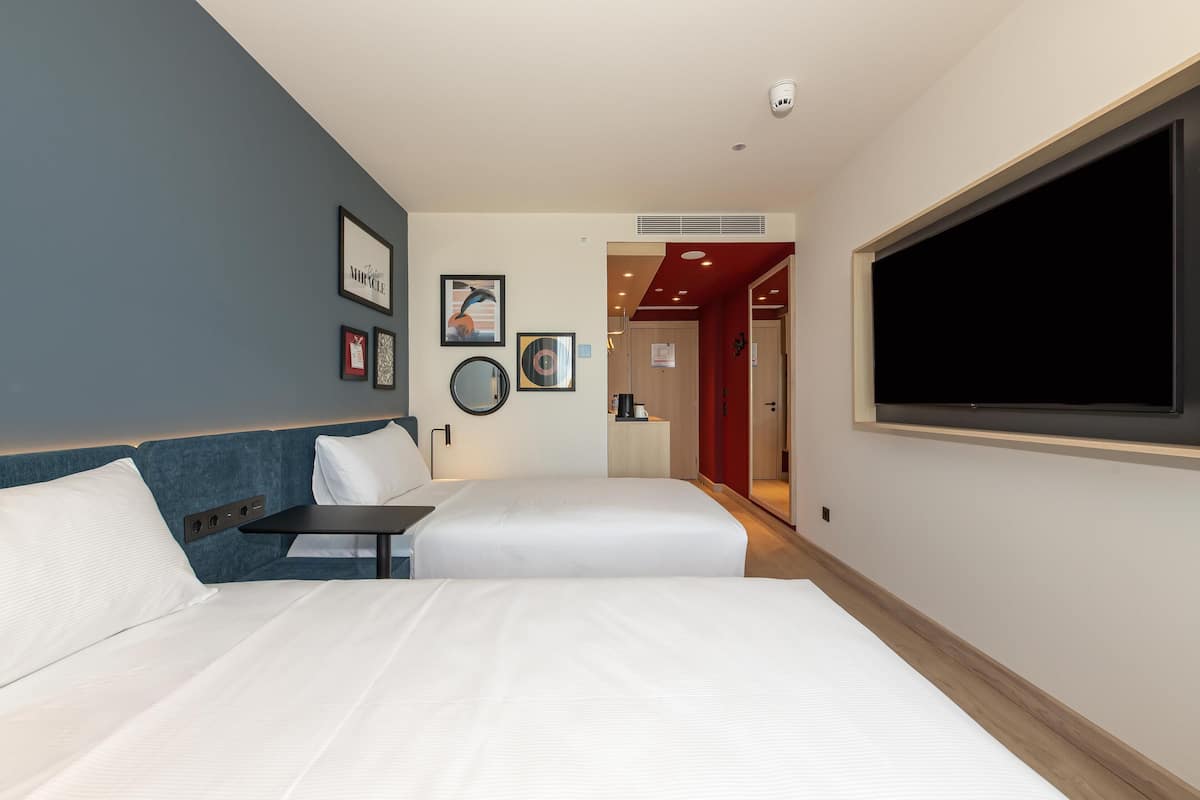 Room, 2 Twin Beds | In-room safe, desk, iron/ironing board, free cribs/infant beds