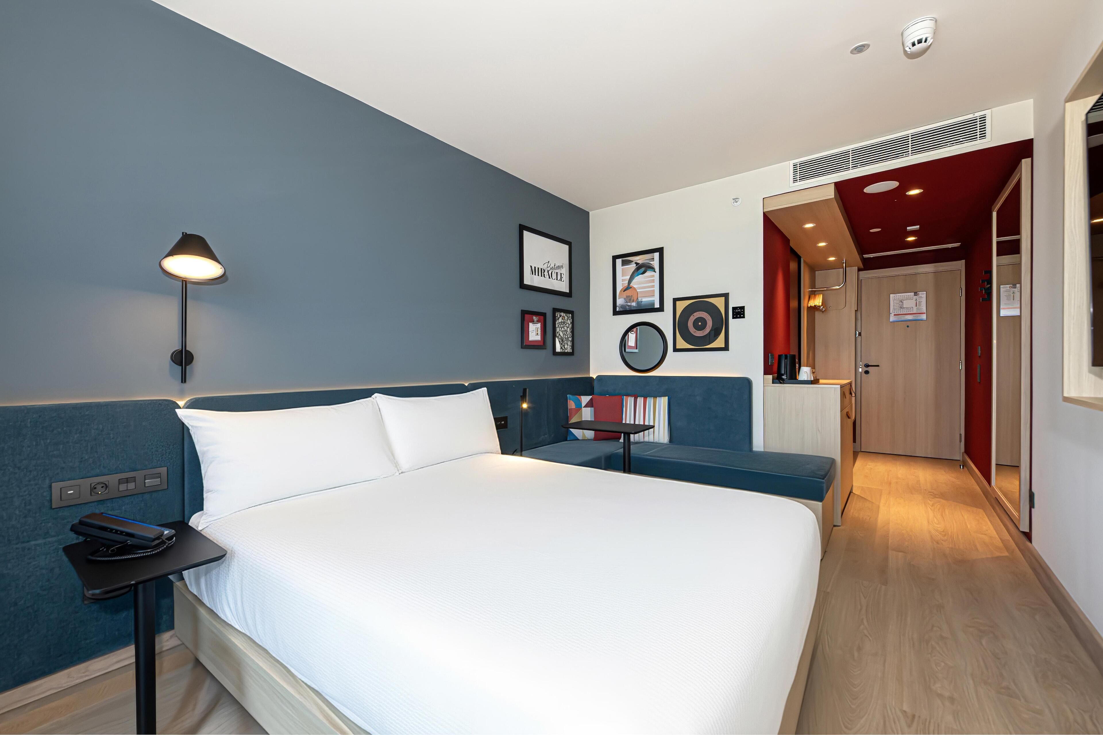 Room, 1 Queen Bed with Sofa bed | In-room safe, desk, iron/ironing board, free cribs/infant beds