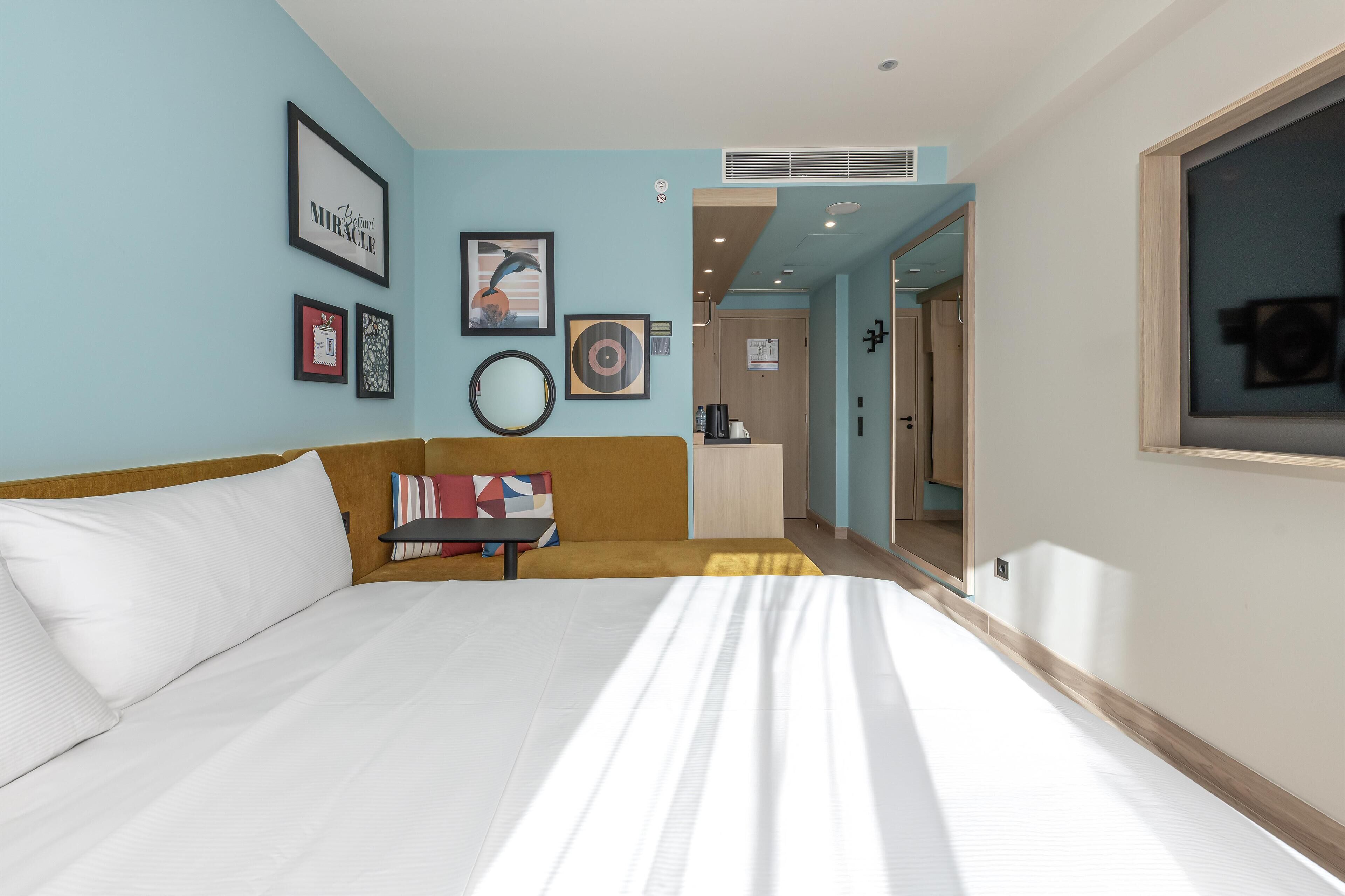 Room, 1 King Bed (View) | In-room safe, desk, iron/ironing board, free cribs/infant beds