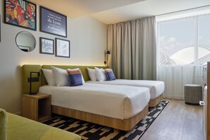 Room, Multiple Beds | In-room safe, individually decorated, blackout drapes, soundproofing