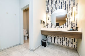 Shower, hair dryer, soap, shampoo