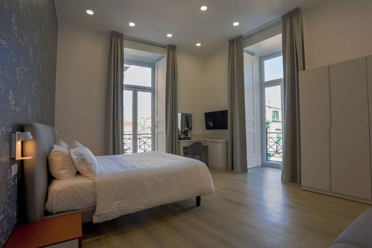 Superior Room, Balcony, City View | In-room safe, desk, laptop workspace, blackout curtains