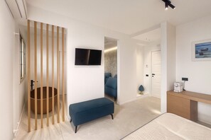 Deluxe Suite, Balcony, Partial Sea View | Desk, laptop workspace, free WiFi