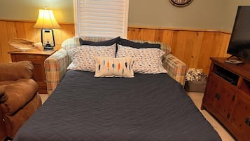 1 bedroom, desk, iron/ironing board, travel crib