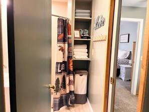 1 bedroom, desk, iron/ironing board, travel crib