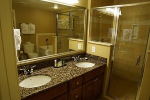 Shower, jetted tub, hair dryer, towels