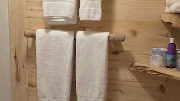 Hair dryer, towels, soap, toilet paper