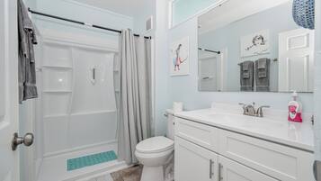 Shower, towels, toilet paper