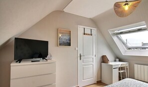 Iron/ironing board, travel crib, free WiFi, bed sheets