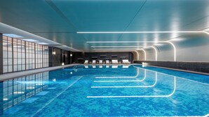 A modern indoor swimming pool with clear lane markings and contemporary lighting. - Crowne Plaza Beijing Tongzhou by IHG (Tongzhou)