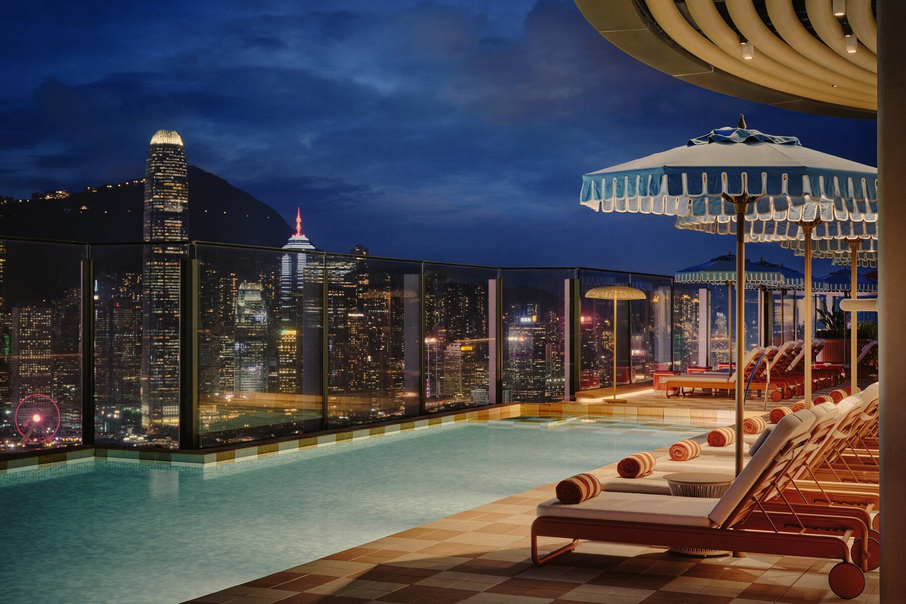 Outdoor pool, open 7:00 AM to 7:00 PM, free pool cabanas, pool umbrellas